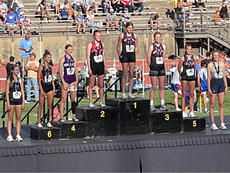Jayme on the medal stand at state track  